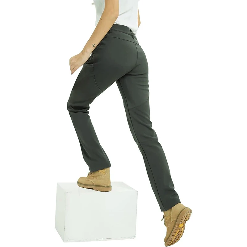 Pantalon randonnée imperméable femme kaki, respirant et extensible pour un confort optimal et une protection efficace contre les intempéries en randonnée.