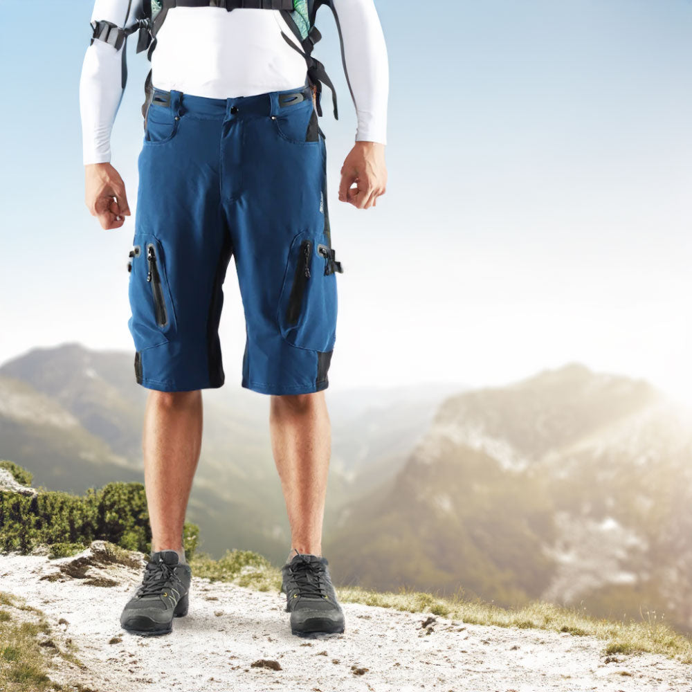 Short de randonnée bleu homme résistant et respirant pour un confort optimal sur les sentiers