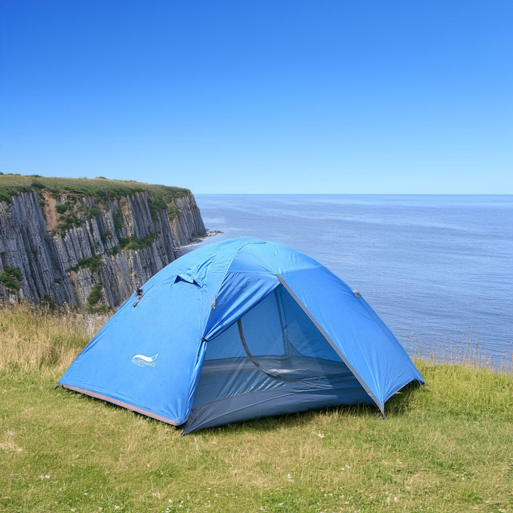 Tente camping bleue étanche pour 2 personnes, idéale pour bivouac et trekking.